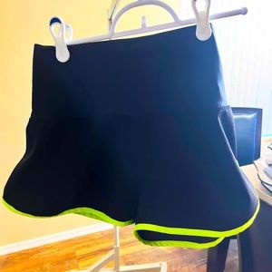 Five dance wear black and green shorts